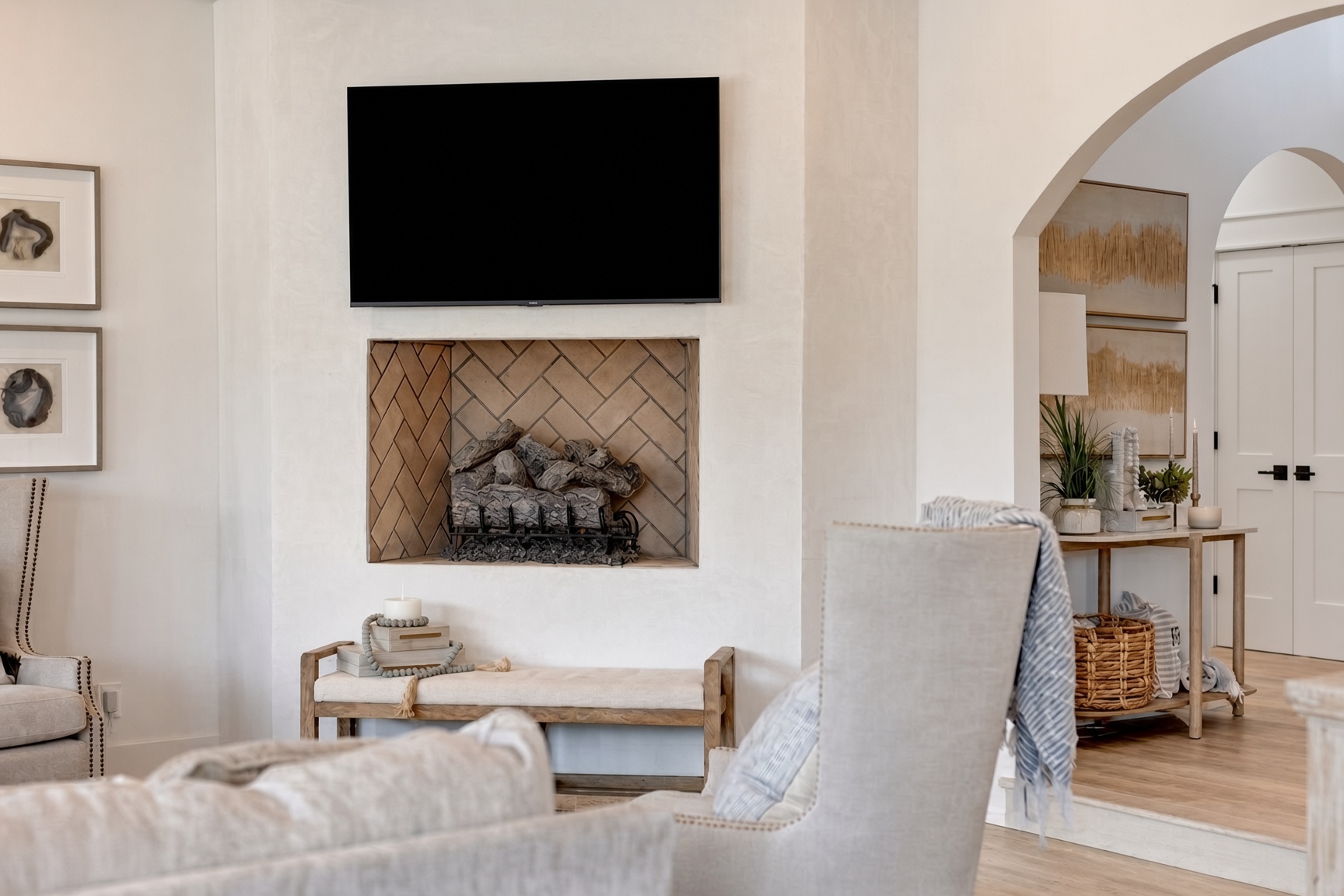 Before: plain room — no fire, lamps off, TV off